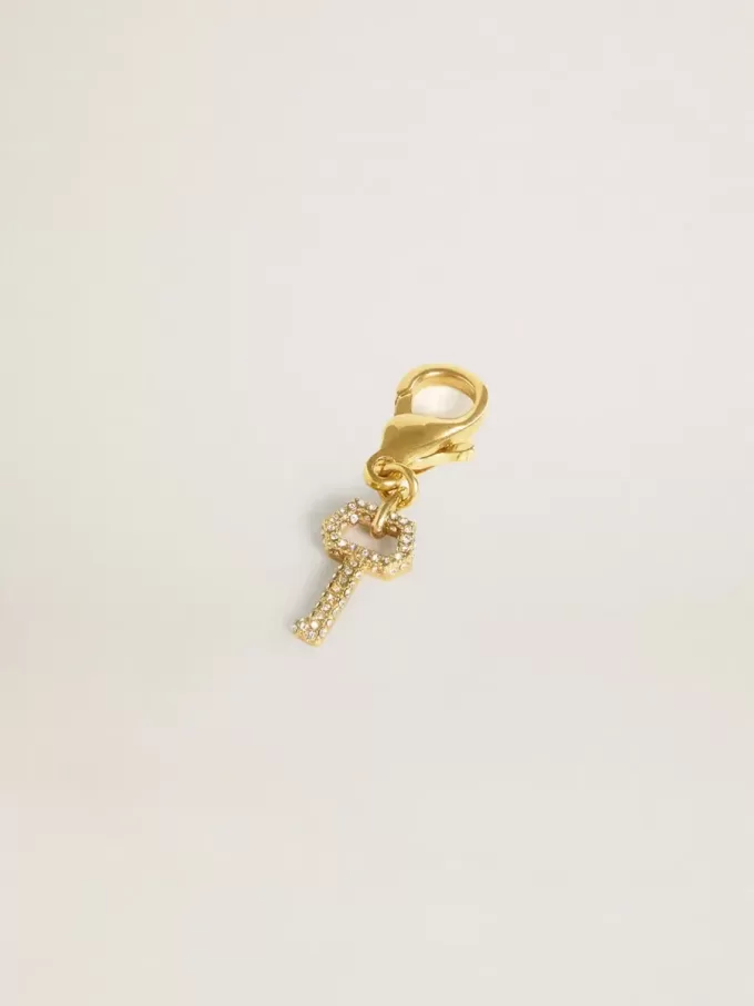 Colgante con forma de llave en latón dorado con cristales Colgante con forma de llave en latón dorado con cristales