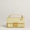 Colgante con forma de monedero en latón dorado con cristales Colgante con forma de monedero en latón dorado con cristales