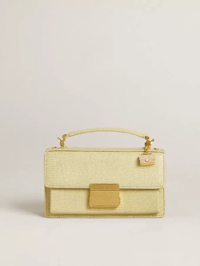 Colgante con forma de monedero en latón dorado con cristales Colgante con forma de monedero en latón dorado con cristales