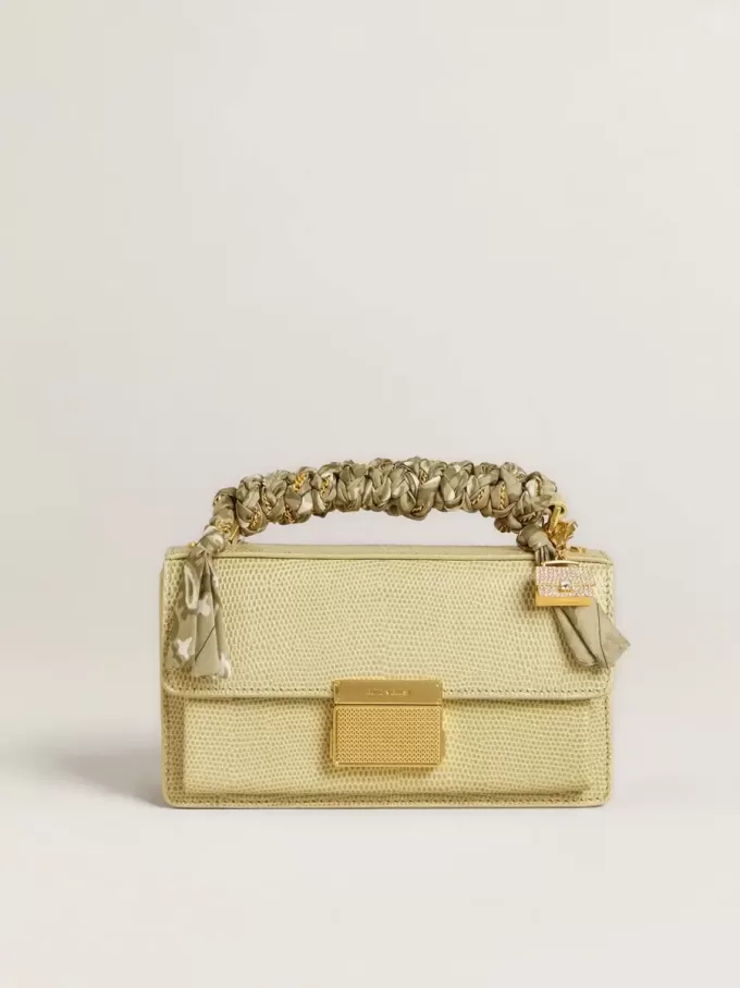 Colgante con forma de monedero en latón dorado con cristales Colgante con forma de monedero en latón dorado con cristales