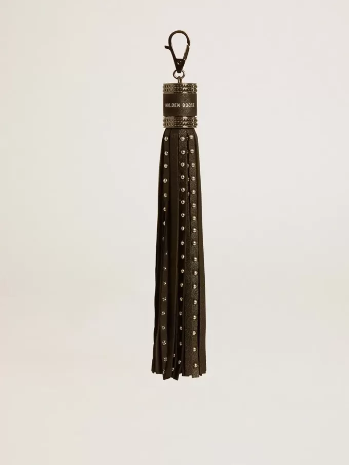 Colgante de piel napa negra con tachuelas y detalles metálicos Colgante de piel napa negra con tachuelas y detalles metálicos