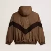Cortavientos en beige y negro con estampado de pata de gallo Cortavientos en beige y negro con estampado de pata de gallo