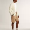 Cárdigan blanco de algodón para hombre con diseño de trenzado y ribetes azules Cárdigan blanco de algodón para hombre con diseño de trenzado y ribetes azules
