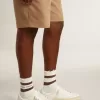 Cárdigan blanco de algodón para hombre con diseño de trenzado y ribetes azules Cárdigan blanco de algodón para hombre con diseño de trenzado y ribetes azules