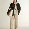 Cárdigan de mujer con estampado floral y bordados Cárdigan de mujer con estampado floral y bordados