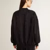 Cárdigan negro de mujer con bordado de cuentas tono sobre tono toile de jouy. Cárdigan negro de mujer con bordado de cuentas tono sobre tono toile de jouy.