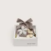 Cueros «Sparkling» marrón, negro y plateado con cordones en espiga y dos charms aplicados
