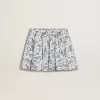 Falda blanca para niña con estampado azul Falda blanca para niña con estampado azul