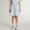 Falda blanca para niña con estampado azul Falda blanca para niña con estampado azul