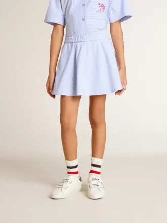 Falda de niña con rayas azul claro