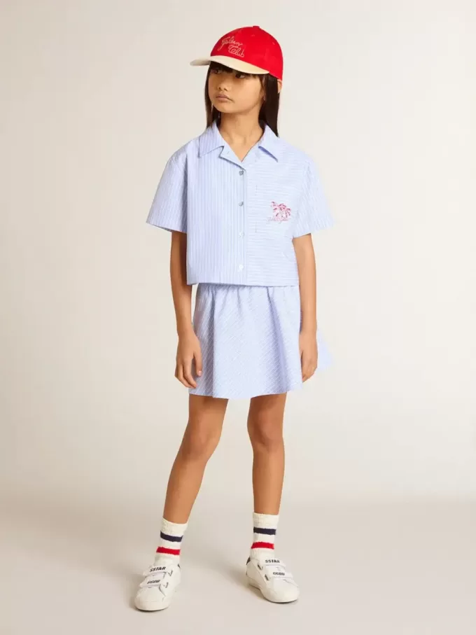 Falda de niña con rayas azul claro Falda de niña con rayas azul claro