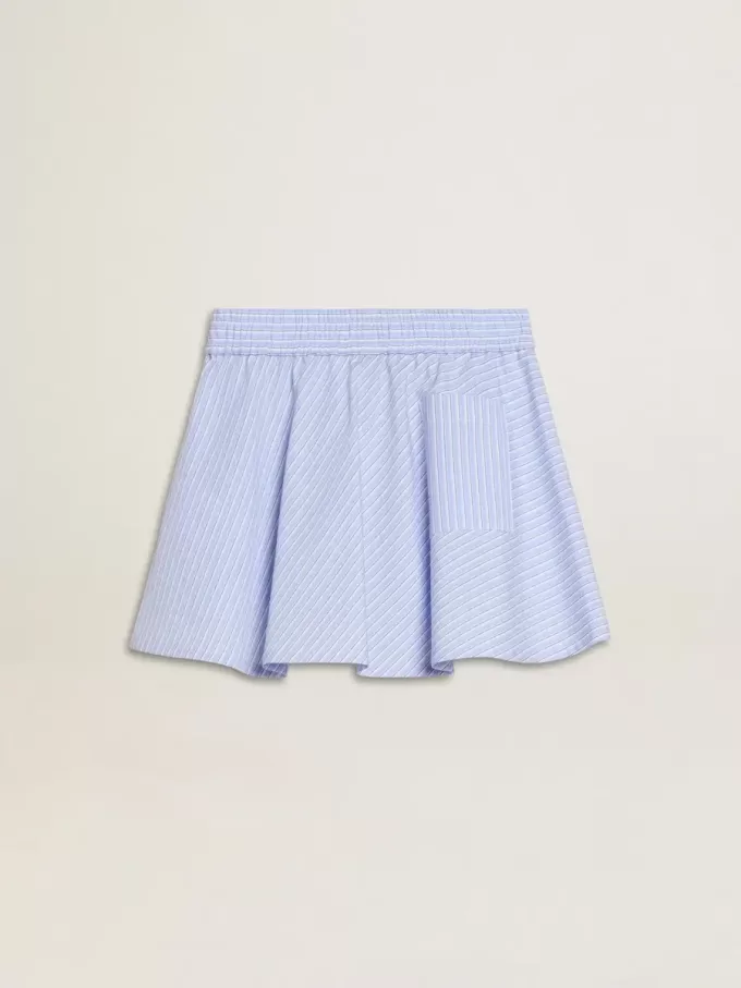 Falda de niña con rayas azul claro Falda de niña con rayas azul claro