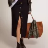 Falda lápiz de mujer en lana azul oscuro con botones heráldicos dorados