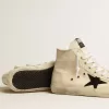 Francy Penstar en lona con estrella de ante negro y lengüeta de cuero en el talón Francy Penstar en lona con estrella de ante negro y lengüeta de cuero en el talón