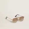 Gafas de sol estilo aviador con montura dorada y lentes beige Gafas de sol estilo aviador con montura dorada y lentes beige