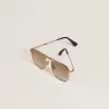 Gafas de sol estilo aviador con montura dorada y lentes beige Gafas de sol estilo aviador con montura dorada y lentes beige