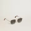 Gafas de sol estilo aviador con montura plateada y lentes azules Gafas de sol estilo aviador con montura plateada y lentes azules