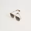 Gafas de sol estilo aviador con montura plateada y lentes azules Gafas de sol estilo aviador con montura plateada y lentes azules