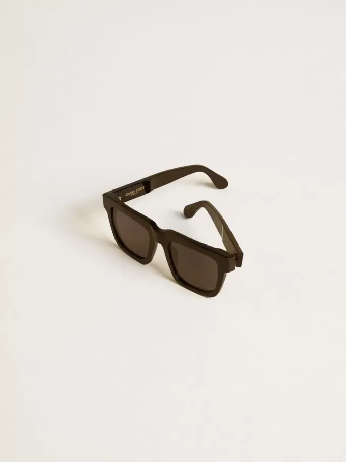 Gafas de sol Jamie de estilo cuadrado con montura negra y logotipo dorado Gafas de sol Jamie de estilo cuadrado con montura negra y logotipo dorado
