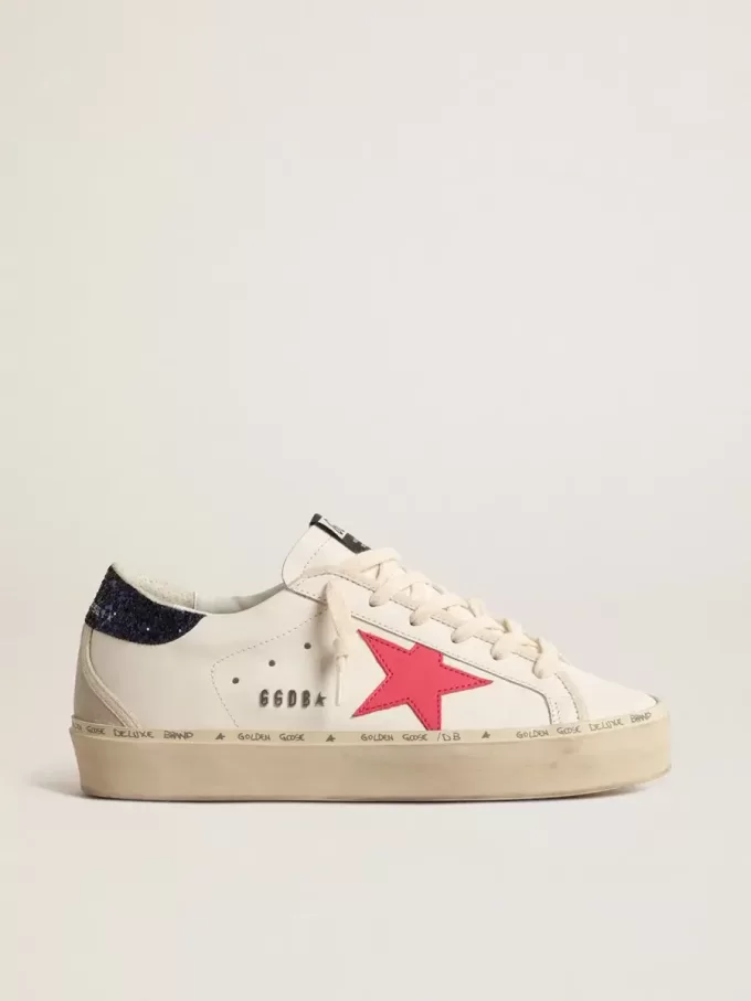 Hi Star con estrella de piel fucsia y lengüeta azul brillante en el talón Hi Star con estrella de piel fucsia y lengüeta azul brillante en el talón