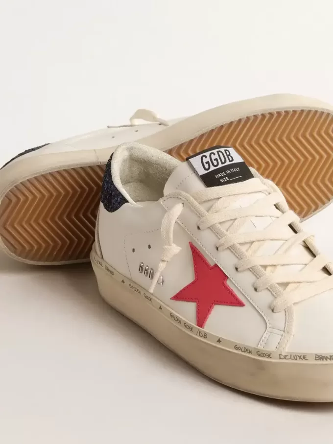 Hi Star con estrella de piel fucsia y lengüeta azul brillante en el talón Hi Star con estrella de piel fucsia y lengüeta azul brillante en el talón