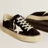 Hi Star en terciopelo negro con estrella de cuero blanco y lengüeta de ante en el talón Hi Star en terciopelo negro con estrella de cuero blanco y lengüeta de ante en el talón