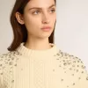 Jersey corto blanco desgastado para mujer con cristales decorativos Jersey corto blanco desgastado para mujer con cristales decorativos