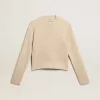 Jersey corto de cuello redondo en lana beige con cristales por toda la superficie Jersey corto de cuello redondo en lana beige con cristales por toda la superficie
