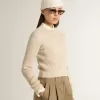 Jersey corto de cuello redondo en lana beige con cristales por toda la superficie Jersey corto de cuello redondo en lana beige con cristales por toda la superficie
