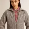 Jersey corto de mujer en lana gris jaspeada con lentejuelas Jersey corto de mujer en lana gris jaspeada con lentejuelas