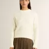 Jersey de cuello redondo para mujer en lana merino blanca con cristales por toda la prenda