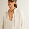 Jersey de lana acanalado con cuello en V y cordón con borlas Jersey de lana acanalado con cuello en V y cordón con borlas