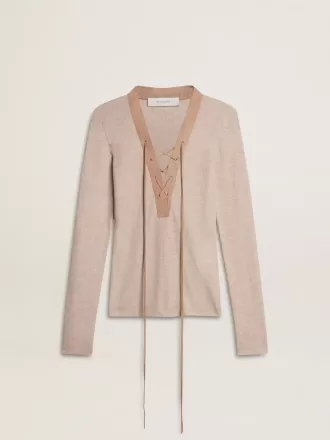 Jersey de lana beige con detalles de piel