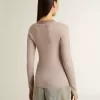 Jersey de lana beige con detalles de piel Jersey de lana beige con detalles de piel