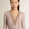 Jersey de lana beige con detalles de piel Jersey de lana beige con detalles de piel