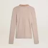 Jersey de lana beige con detalles de piel Jersey de lana beige con detalles de piel