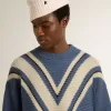 Jersey de lana jacquard azul claro para hombre con estampado en color crema Jersey de lana jacquard azul claro para hombre con estampado en color crema