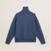 Jersey de lana jacquard azul claro para mujer con estampado color crema. Jersey de lana jacquard azul claro para mujer con estampado color crema.
