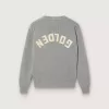 Jersey unisex Golden para niños en gris jaspeado acanalado con logotipo en la espalda