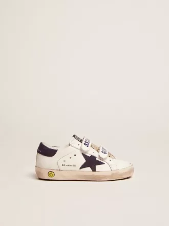 Junior Old School en piel blanca con estrella y lengüeta en el talón de ante azul