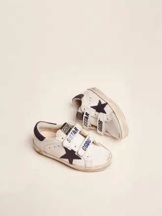 Junior Old School en piel blanca con estrella y lengüeta en el talón de ante azul