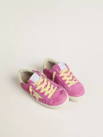 Junior Super-Star en ante rosa con estrella amarilla clara y lengüeta en el talón