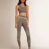 Leggings grises jaspeados para mujer con costuras mixtas Leggings grises jaspeados para mujer con costuras mixtas