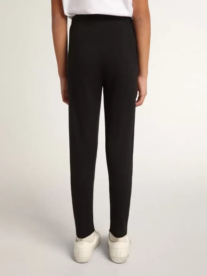 Leggings negros para niña con estrellas blancas en los laterales Leggings negros para niña con estrellas blancas en los laterales