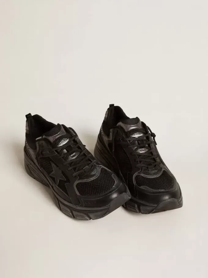 Lightstar para hombre con parte superior de cuero negro y malla y estrella negra Lightstar para hombre con parte superior de cuero negro y malla y estrella negra