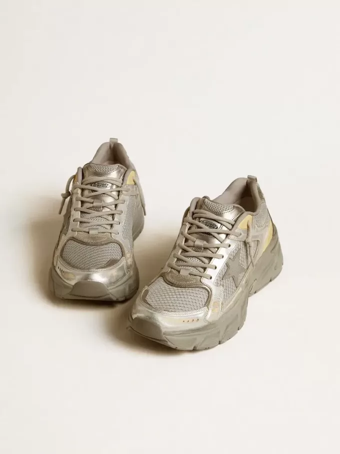 Lightstar para hombre en piel metalizada y malla plateada con estrella gris Lightstar para hombre en piel metalizada y malla plateada con estrella gris
