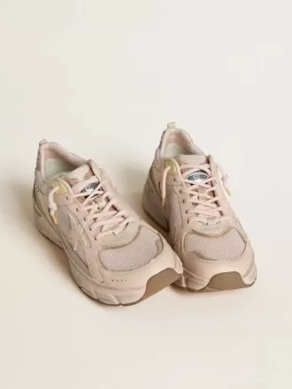 Lightstar para mujer con parte superior de piel rosa y malla y estrella rosa