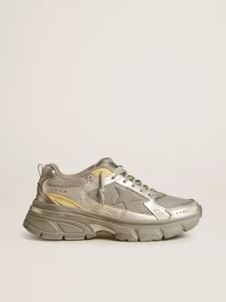 Lightstar para mujer en piel metalizada y malla plateada con estrella gris