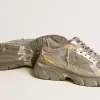 Lightstar para mujer en piel metalizada y malla plateada con estrella gris Lightstar para mujer en piel metalizada y malla plateada con estrella gris