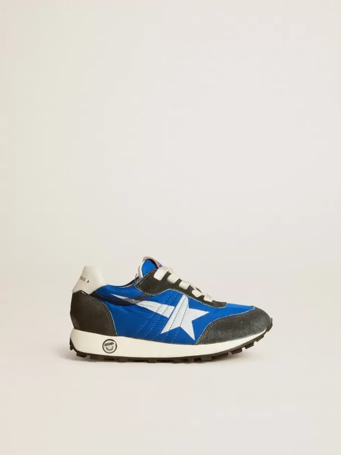 Marathon Junior en nailon azul con estrella estampada y lengüeta de cuero en el talón